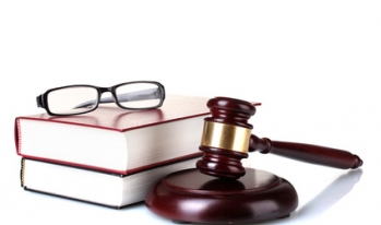 gavel with books and glasses gavel with books and glasses