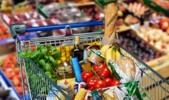 grocery cart filled with food grocery cart filled with food