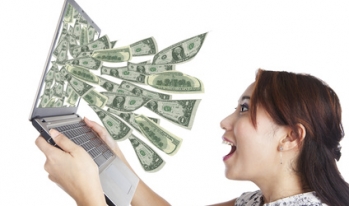 woman with laptop money woman with laptop money