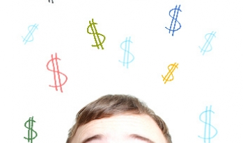 Man looking at different dollar signs Man looking at different dollar signs
