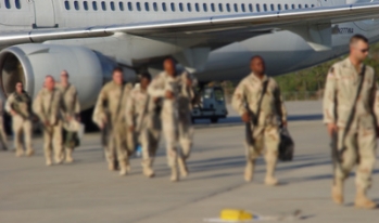 military veterans departing a plane military veterans departing a plane