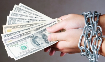 chained hands holding money chained hands holding money