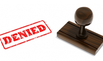 Stamp saying "denied" Stamp saying "denied"