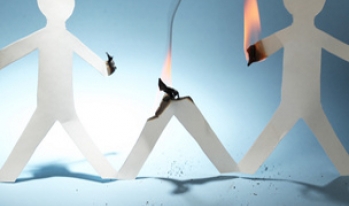 Paper person burnt by fire Paper person burnt by fire