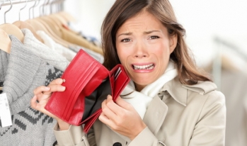 a woman with an empty wallet a woman with an empty wallet