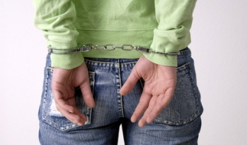 Woman arrested and handcuffed Woman arrested and handcuffed