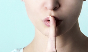 Woman calling for silence Woman calling for silence