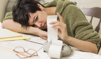 woman stressed by money woman stressed by money
