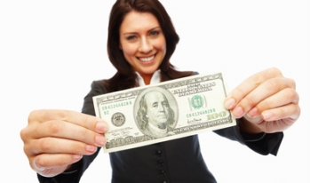 Woman holding hundred dollar bill Woman holding hundred dollar bill
